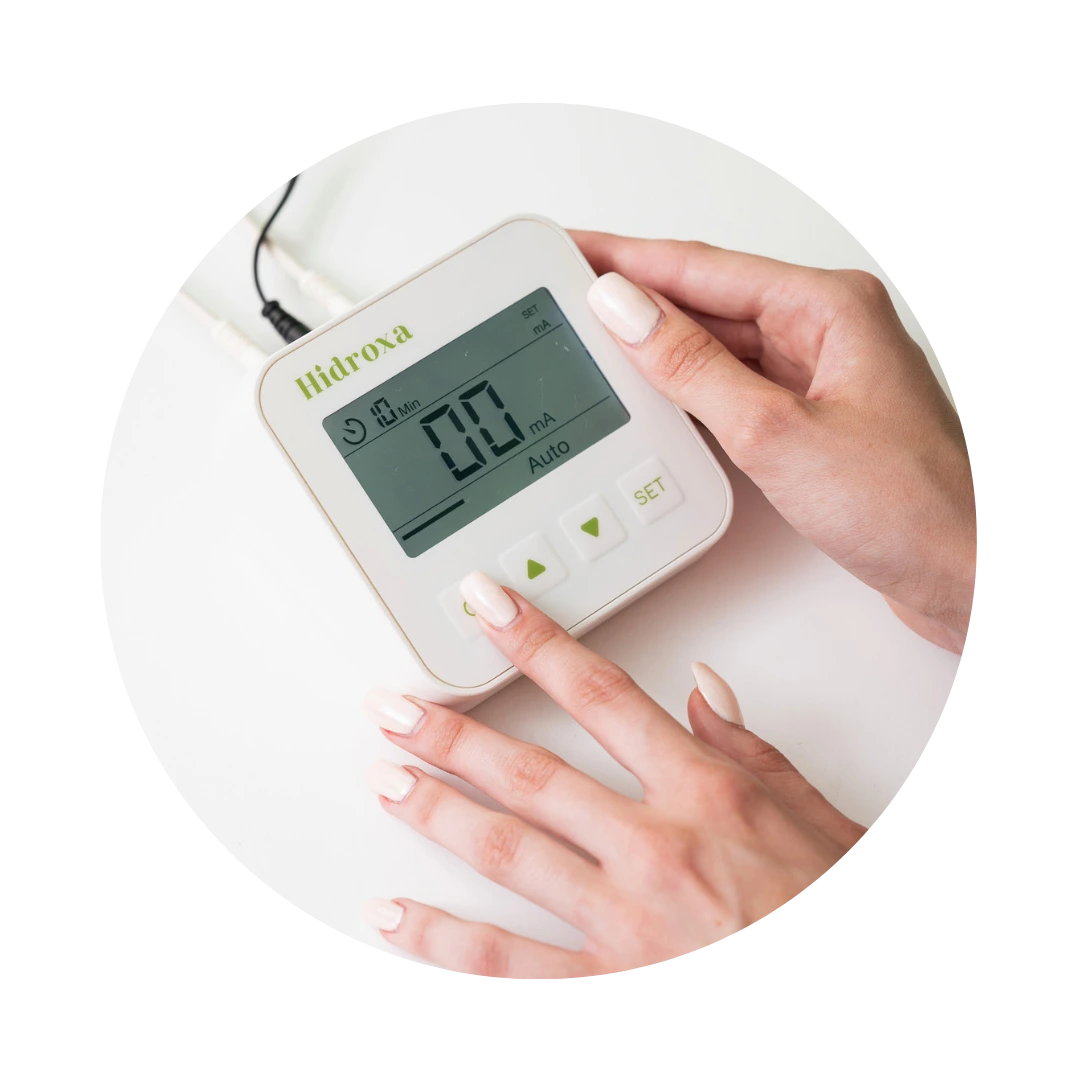 Adjusting Hidroxa iontophoresis machine settings for hyperhidrosis treatment